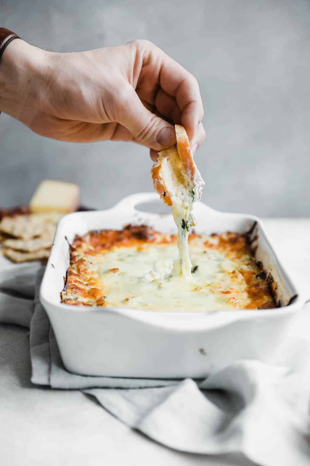 spinach artichoke bacon dip I howsweeteats.com #spinach #artichoke #bacon #dip #appetizers