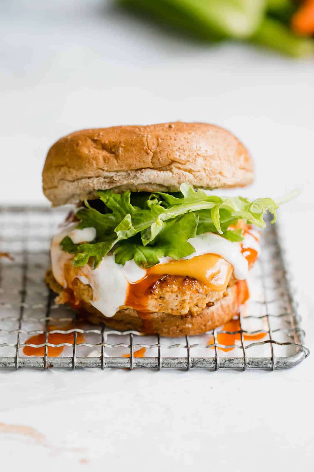 buffalo chicken burgers I howsweeteats.com #buffalo #chicken #burgers