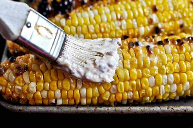 Grilled Corn with Bacon Butter and Cotija Cheese I howsweeteats.com Grilled Corn with Bacon Butter and Cotija Cheese I howsweeteats.com