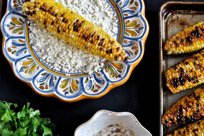 Grilled Corn with Bacon Butter and Cotija Cheese I howsweeteats.com Grilled Corn with Bacon Butter and Cotija Cheese I howsweeteats.com