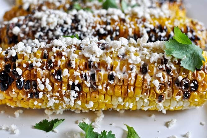 Grilled Corn with Bacon Butter and Cotija Cheese I howsweeteats.com Grilled Corn with Bacon Butter and Cotija Cheese I howsweeteats.com