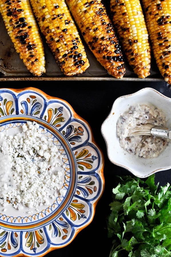 Grilled Corn with Bacon Butter and Cotija Cheese I howsweeteats.com Grilled Corn with Bacon Butter and Cotija Cheese I howsweeteats.com