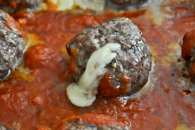Cheesy Stuffed Meatball Sliders I howsweeteats.com Cheesy Stuffed Meatball Sliders I howsweeteats.com