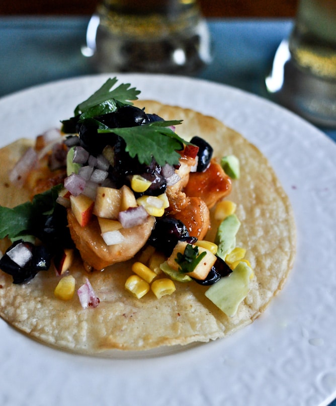 Sweet + Spicy Glazed Chicken, Corn + Avocado Tostadas with Blueberry Peach Salsa I howsweeteats.com Sweet + Spicy Glazed Chicken, Corn + Avocado Tostadas with Blueberry Peach Salsa I howsweeteats.com