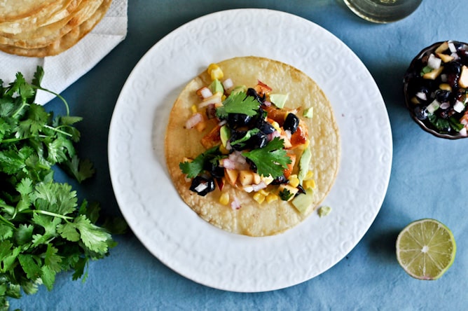 Sweet + Spicy Glazed Chicken, Corn + Avocado Tostadas with Blueberry Peach Salsa I howsweeteats.com Sweet + Spicy Glazed Chicken, Corn + Avocado Tostadas with Blueberry Peach Salsa I howsweeteats.com