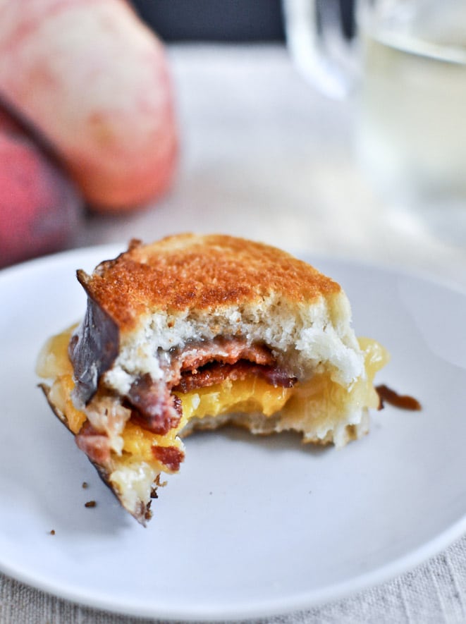 Peach, Bacon + Gouda Grilled Cheese Sliders on Pretzel Bread I howsweeteats.com Peach, Bacon + Gouda Grilled Cheese Sliders on Pretzel Bread I howsweeteats.com