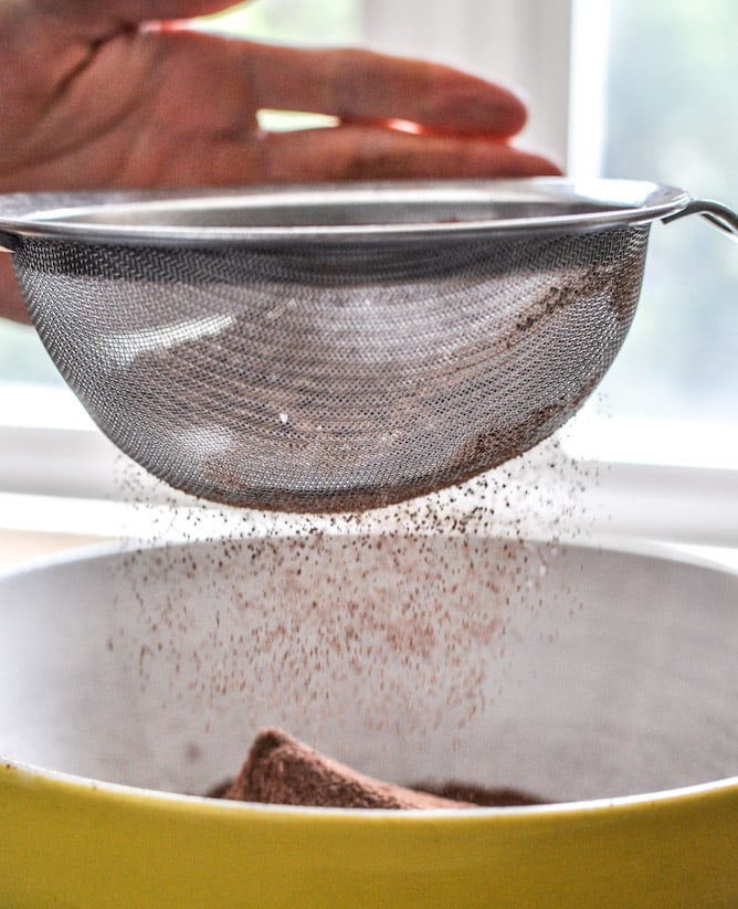 Glazed and Sprinkled Chocolate Cake Donut Holes I howsweeteats.com Glazed and Sprinkled Chocolate Cake Donut Holes I howsweeteats.com