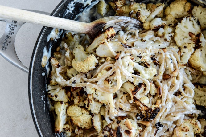 Broiled Salmon and Roasted Garlic Cream Noodles with Crispy Cauliflower + Toasted Pine Nuts I howsweeteats.com Broiled Salmon and Roasted Garlic Cream Noodles with Crispy Cauliflower + Toasted Pine Nuts I howsweeteats.com