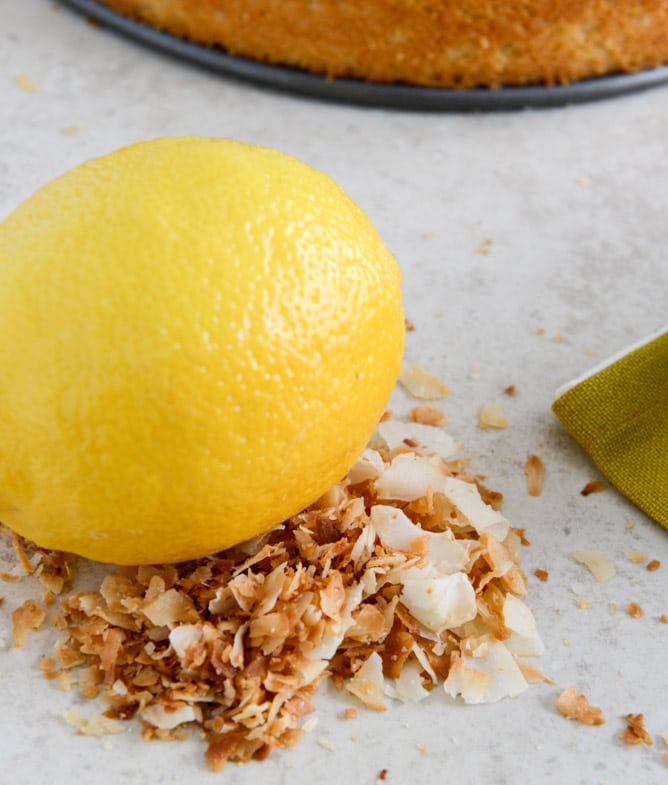 Easy Lemon Cake with Marshmallow Frosting + Toasted Coconut I howsweeteats.com Easy Lemon Cake with Marshmallow Frosting + Toasted Coconut I howsweeteats.com