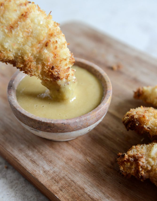 Crunchy Coconut Chicken Fingers with Peach Honey Mustard I howsweeteats.com Crunchy Coconut Chicken Fingers with Peach Honey Mustard I howsweeteats.com