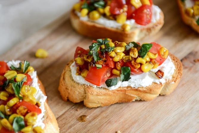 Summer Crostini with Whipped Roasted Garlic Goat Cheese I howsweeteats.com Summer Crostini with Whipped Roasted Garlic Goat Cheese I howsweeteats.com