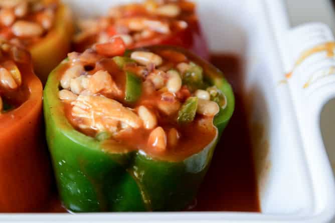 White Bean + Chicken Enchilada Stuffed Peppers I howsweeteats.com White Bean + Chicken Enchilada Stuffed Peppers I howsweeteats.com