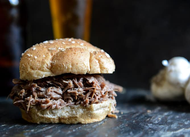 Crockpot Brown Sugar + Roasted Garlic Pulled Pot Roast Sandwiches I howsweeteats.com Crockpot Brown Sugar + Roasted Garlic Pulled Pot Roast Sandwiches I howsweeteats.com
