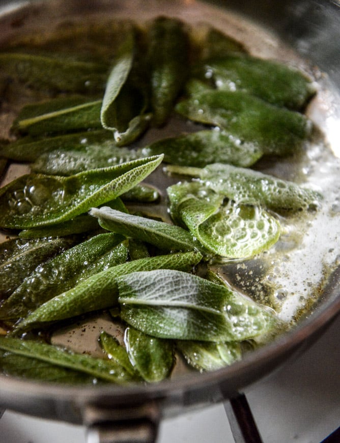 bacon bourbon whipped sweet potatoes with brown butter and crispy sage I howsweeteats.com bacon bourbon whipped sweet potatoes with brown butter and crispy sage I howsweeteats.com