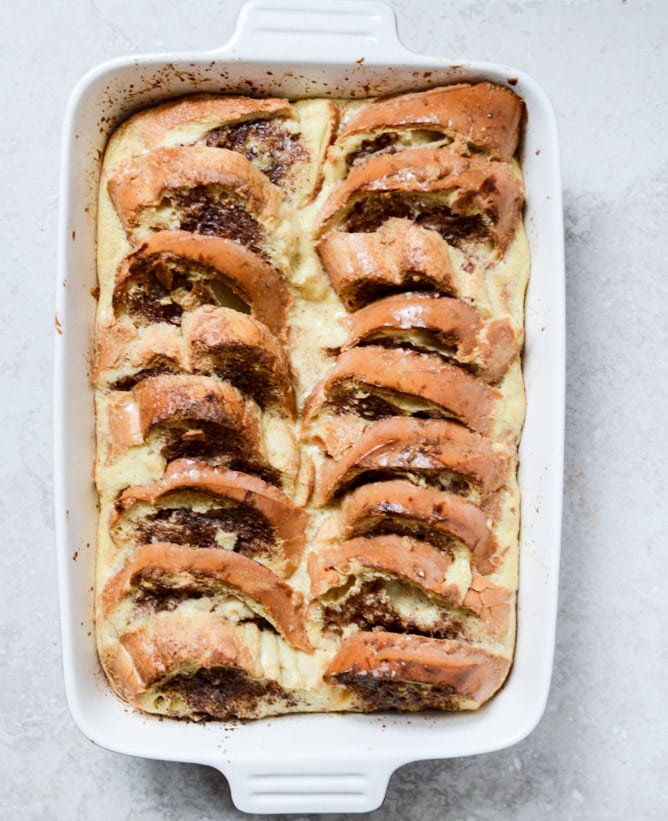 Cinnamon Sugar Sourdough French Toast Bake with Whipped Yogurt Topping I howsweeteats.com Cinnamon Sugar Sourdough French Toast Bake with Whipped Yogurt Topping I howsweeteats.com