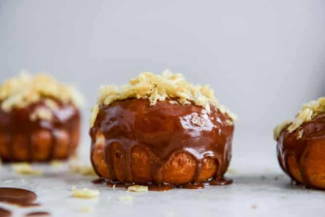 Crunchy Kettle Chip Chocolate Frosted Raised Donuts I howsweeteats.com Crunchy Kettle Chip Chocolate Frosted Raised Donuts I howsweeteats.com