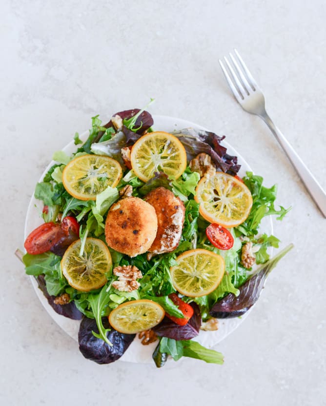 Spring Greens with Candied Meyer Lemons and Spicy Fried Goat Cheese I howsweeteats.com Spring Greens with Candied Meyer Lemons and Spicy Fried Goat Cheese I howsweeteats.com