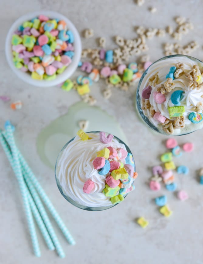 Boozy Lucky Charms Cereal Milkshakes with Marshmallow Frosting I howsweeteats.com Boozy Lucky Charms Cereal Milkshakes with Marshmallow Frosting I howsweeteats.com