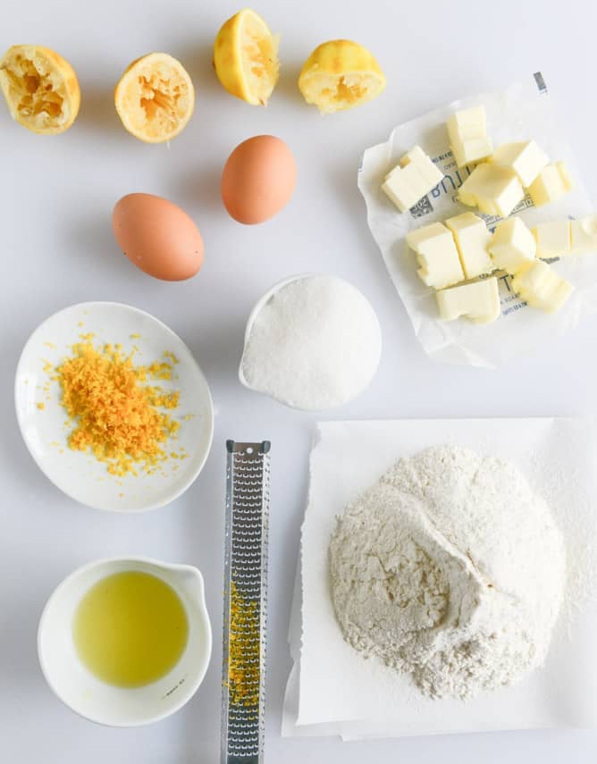 Fluffy Lemon Cupcakes with Whipped Coconut Cream I howsweeteats.com