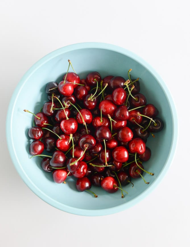 sweet cherry pie with amaretto whipped cream I howsweeteats.com