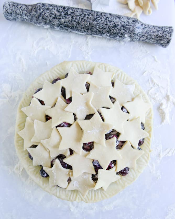 sweet cherry pie with amaretto whipped cream I howsweeteats.com