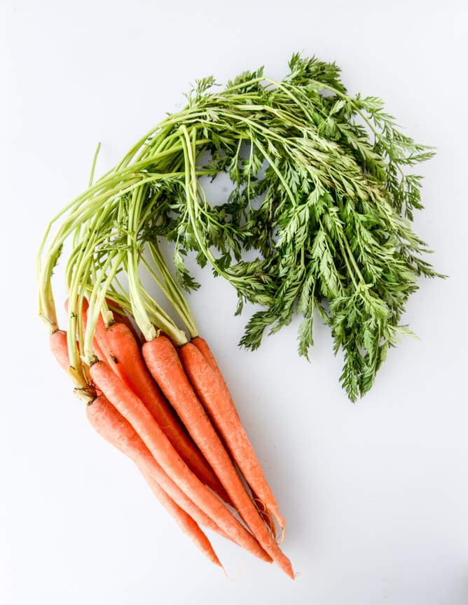 carrot cake cake with nutella swirled cream cheese frosting I howsweeteats.com