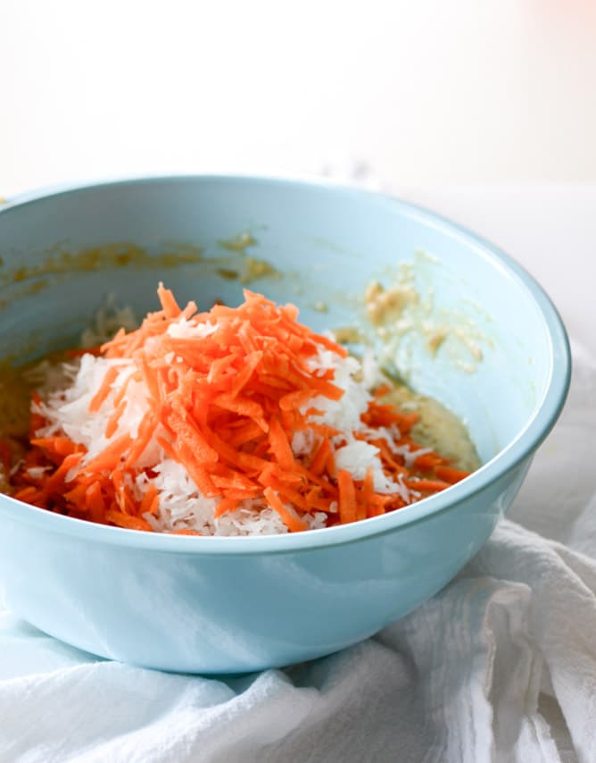 carrot cake cake with nutella swirled cream cheese frosting I howsweeteats.com