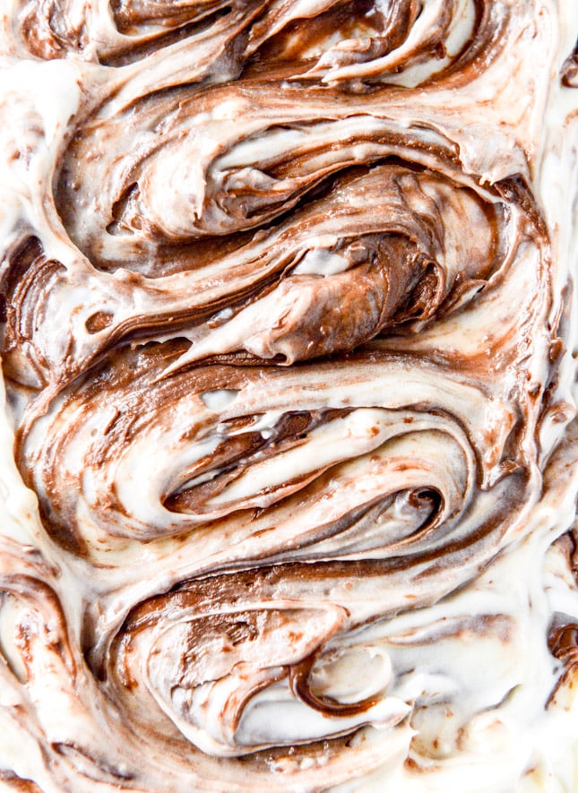 carrot cake cake with nutella swirled cream cheese frosting I howsweeteats.com