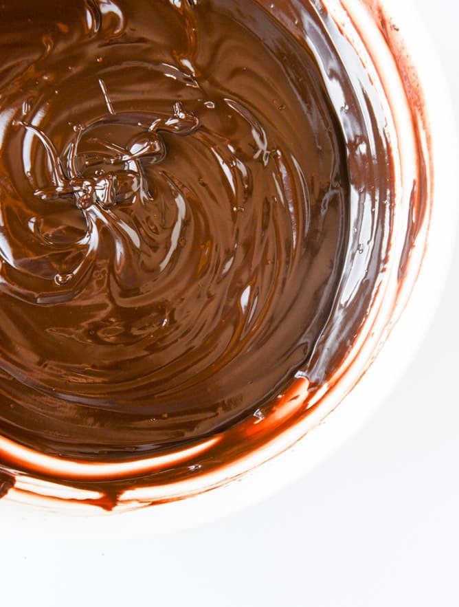 one bowl fudgy whiskey chocolate cake - with irish cream chocolate ganache (and lucky charms marshmallows...) I howsweeteats.com