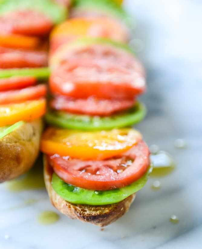 heirloom tomato, avocado and burrata grilled garlic toast I howsweeteats.com