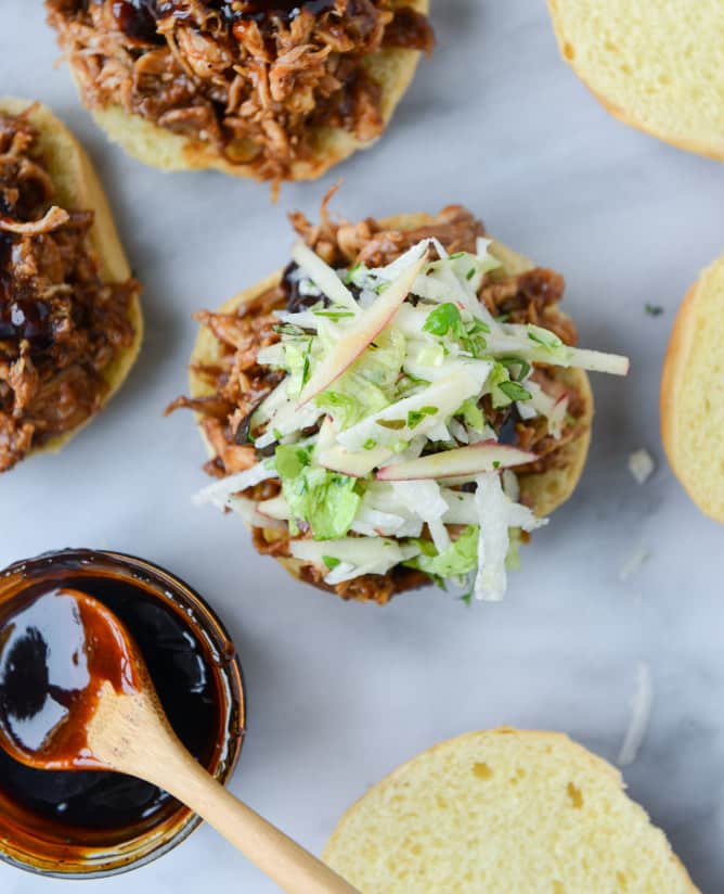 saucy chicken sandwiches with pomegranate bbq sauce and crunchy apple slaw I howsweeteats.com