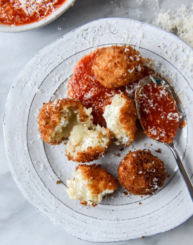 fontina, roasted garlic and goat cheese arancini I howsweeteats.com