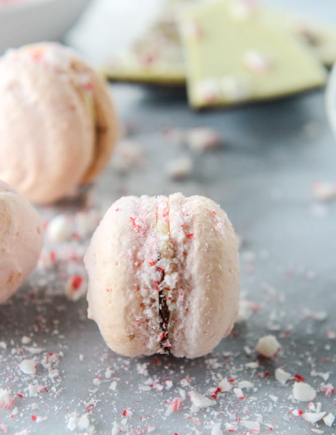 pink peppermint bark macarons I howsweeteats.com