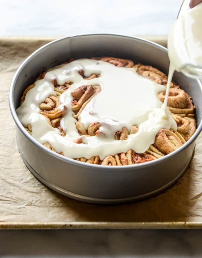 carrot cake cinnamon rolls with mascarpone icing I howsweeteats.com