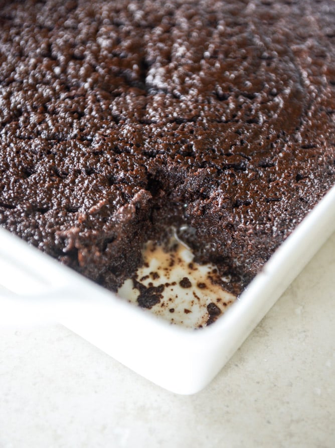 This chocolate tres leches cake is a spin on the classic tres leches. Three milks, one being chocolate milk, soak into the fudgiest cake ever! I howsweeteats.com