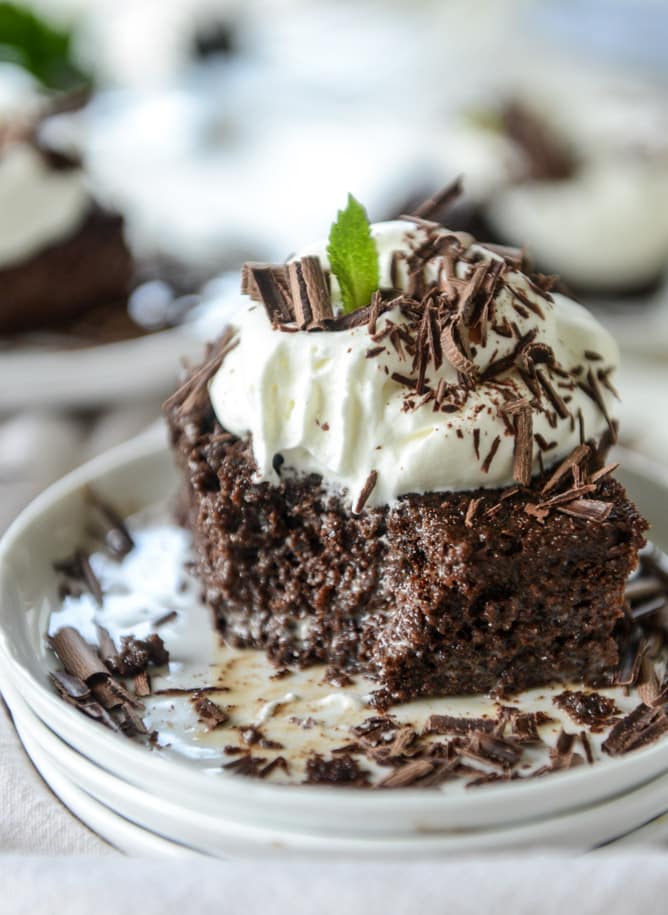 This chocolate tres leches cake is a spin on the classic tres leches. Three milks, one being chocolate milk, soak into the fudgiest cake ever! I howsweeteats.com