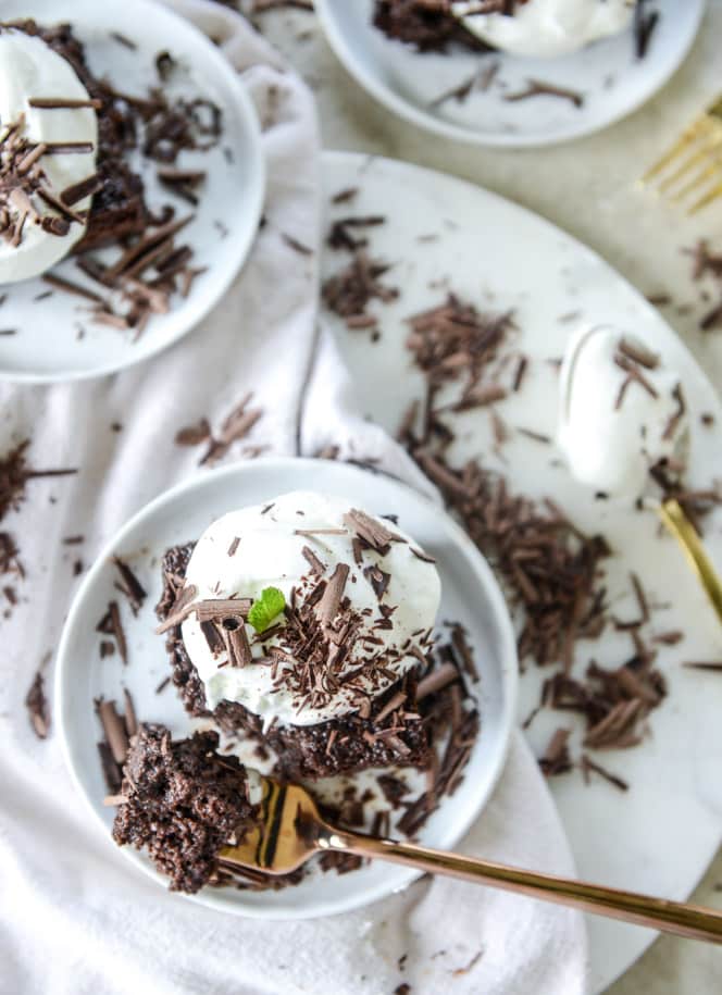 This chocolate tres leches cake is a spin on the classic tres leches. Three milks, one being chocolate milk, soak into the fudgiest cake ever! I howsweeteats.com