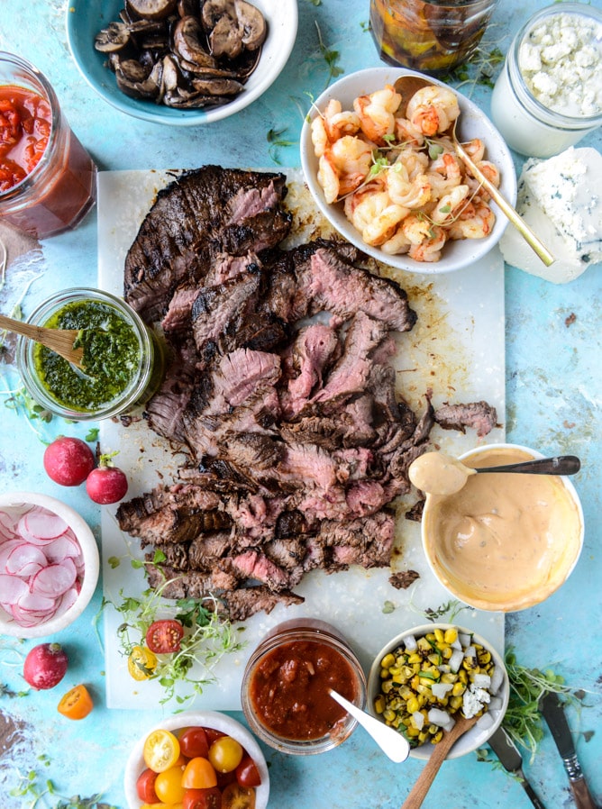 marinated flank steak with our favorite toppings I howsweeteats.com