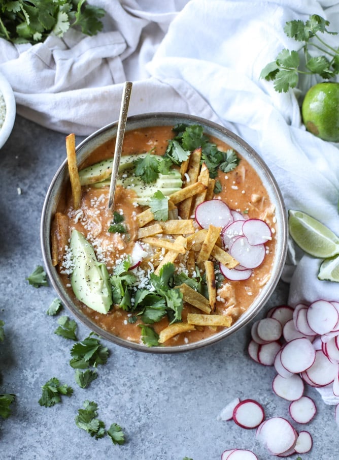 cheesy turkey (or chicken!!) tortilla soup with crispy tortilla strips I howsweeteats.com