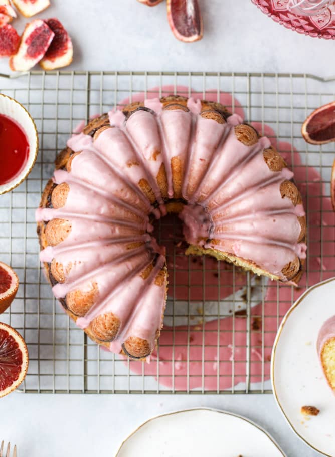 This blood orange coffee cake is made with greek yogurt and the most delicious blood orange glaze! Perfect for a winter breakfast or brunch! I howsweeteats.com #bloodorange #coffeecake