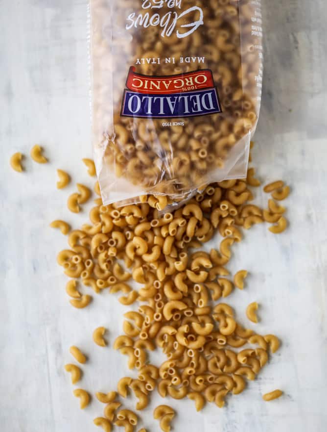 cheesy baked macaroni with bacon and white beans I howsweeteats.com