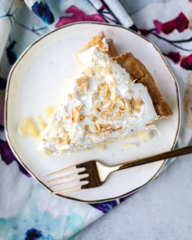 coconut custard pie with coconut whipped cream I howsweeteats.com
