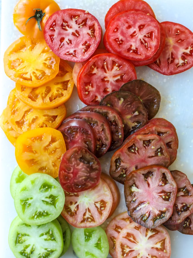 caprese salad with heirloom tomatoes and hot bacon dressing I howsweeteats.com