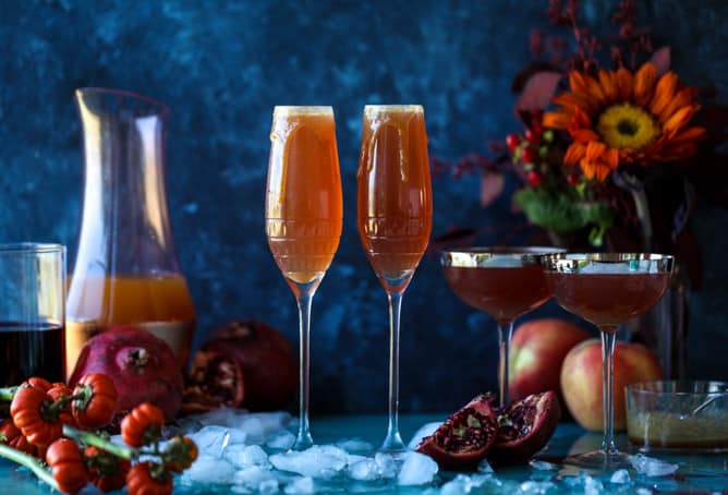 pomegranate cider mimosas with a salted caramel rim I howsweeteats.com #cocktails #thanksgiving #applecider #mimosas