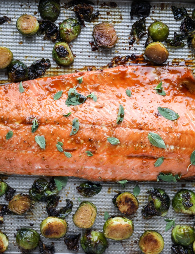 sheet pan honey garlic salmon and brussels I howsweeteats.com #sheetpan #salmon #honeygarlic #brusselssprouts
