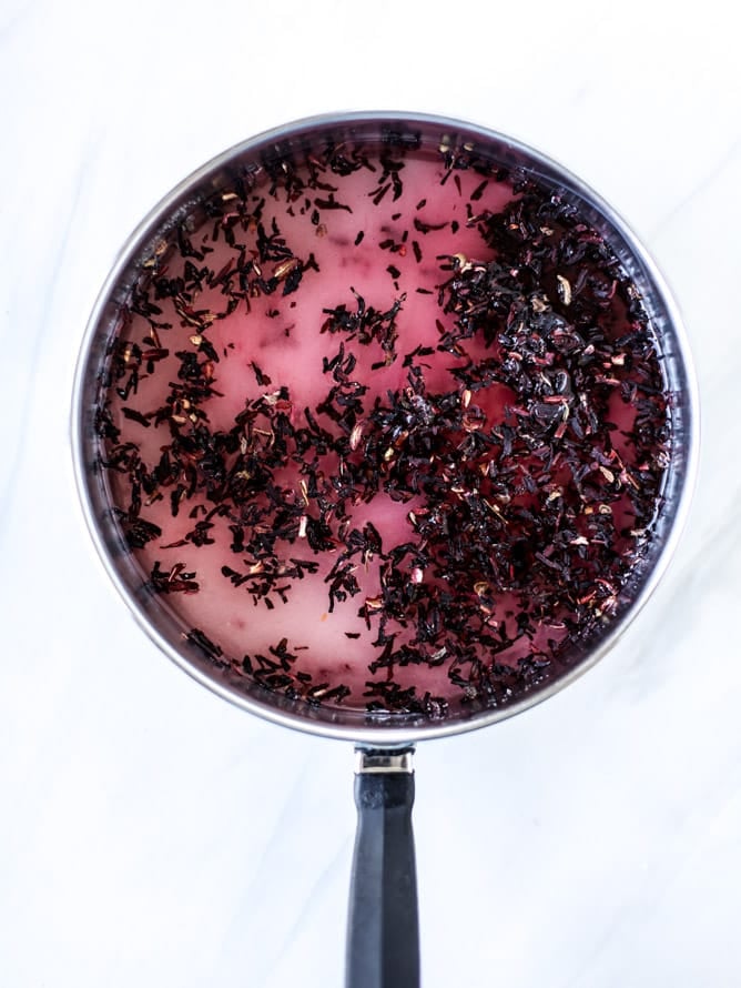 rosé hibiscus mimosas I howsweeteats.com #champagne #mimosa #rose #hibiscus #cocktail