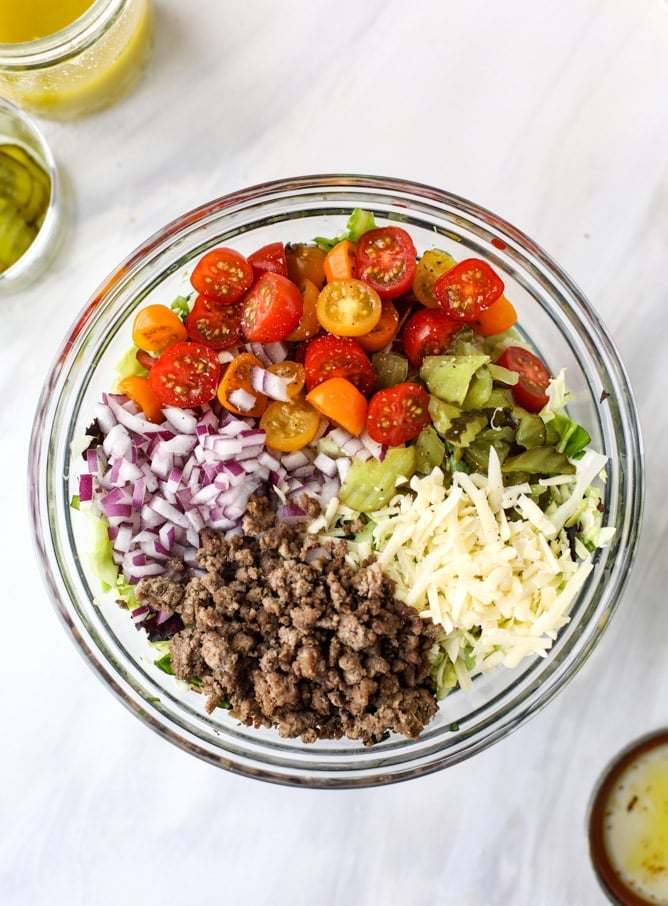 cheeseburger chopped salad I howsweeteats.com #cheeseburger #chopped #salad #dill #pickle #dressing