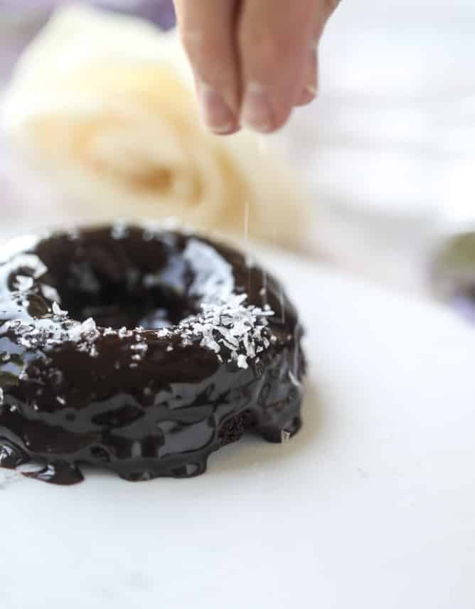 salted dark chocolate fudge donuts I howsweeteats.com #chocolate #donuts #doughtnuts #salted #fudge