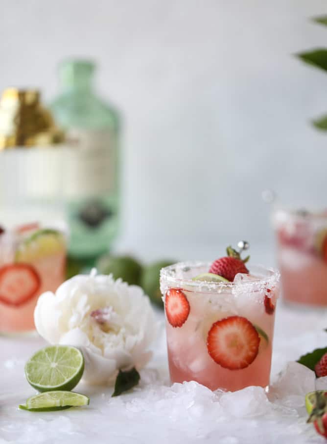 smoked strawberry mezcal margaritas I howsweeteats.com #margaritas #mezcal #strawberry #lime
