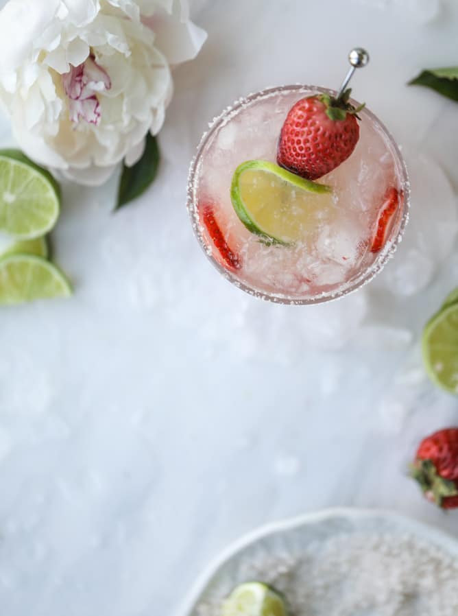 smoked strawberry mezcal margaritas I howsweeteats.com #margaritas #mezcal #strawberry #lime